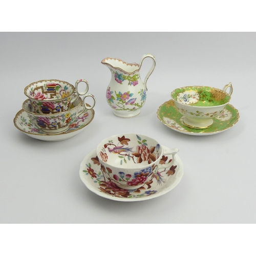 207 - A Minton Chinese tree design tea cup, coffee cup and saucer, a floral cream jug and two cabinet cups... 