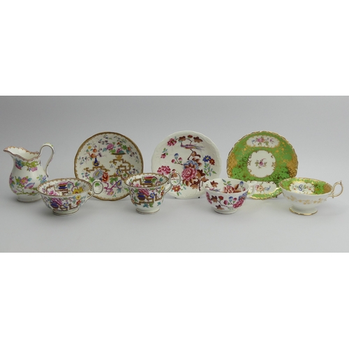 207 - A Minton Chinese tree design tea cup, coffee cup and saucer, a floral cream jug and two cabinet cups... 