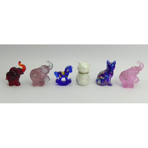 218 - Three Fenton glass elephants, two cats and a rocking horse, 10cm high. UK Postage £14.