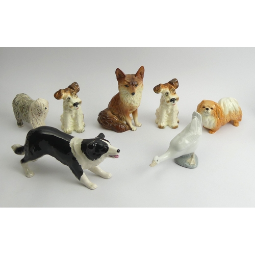 221 - Four Sylvac pottery dogs, a Coopercraft fox, a Nao duck and an old English sheep dog, fox 16cm. UK P... 