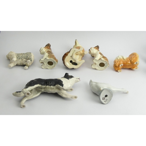 221 - Four Sylvac pottery dogs, a Coopercraft fox, a Nao duck and an old English sheep dog, fox 16cm. UK P... 