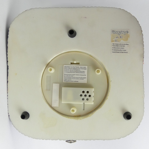 226 - Disney castle musical snow globe with all the Disney Characters, 26cm high. UK Postage £20.