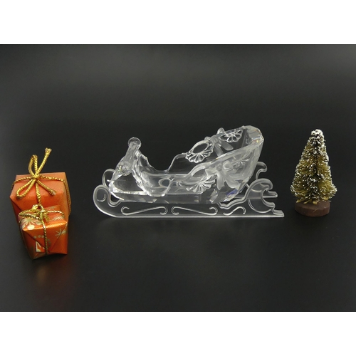 253 - Swarovski crystal Santa's Sleigh with parcels and tree, NR000601, in original box, 10cm long. UK Pos... 