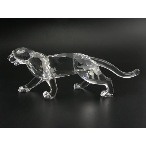 261 - Swarovski crystal Leopard figure 217093, boxed, 14cm long. UK Postage £12.