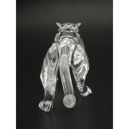 261 - Swarovski crystal Leopard figure 217093, boxed, 14cm long. UK Postage £12.