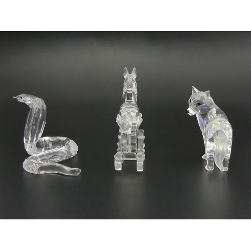 272 - Swarovski crystal Cobra, Rocking Horse and Wolf, all boxed, Wolf 5.5cm. UK Postage £14.