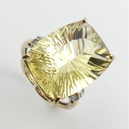 75 - 9ct gold yellow quartz and diamond ring, 4.4 grams, 17. 8mm, Size N. UK Postage £12.