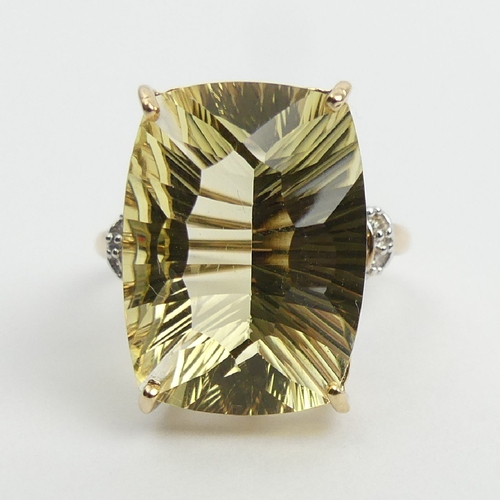 75 - 9ct gold yellow quartz and diamond ring, 4.4 grams, 17. 8mm, Size N. UK Postage £12.