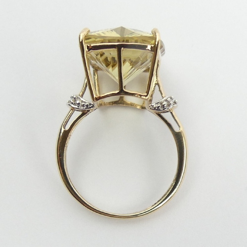 75 - 9ct gold yellow quartz and diamond ring, 4.4 grams, 17. 8mm, Size N. UK Postage £12.