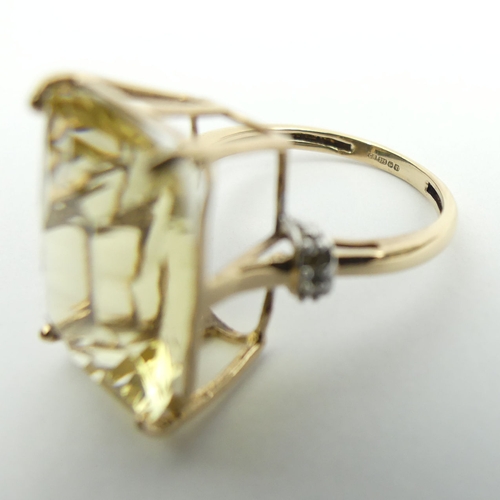 75 - 9ct gold yellow quartz and diamond ring, 4.4 grams, 17. 8mm, Size N. UK Postage £12.