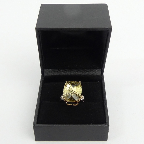 75 - 9ct gold yellow quartz and diamond ring, 4.4 grams, 17. 8mm, Size N. UK Postage £12.