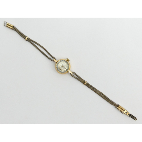 79 - Ladies Omega 14ct gold manual wind watch, 18mm including button. UK Postage £12. Condition Report: W... 