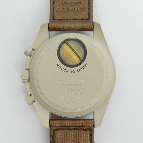 93 - Swatch X Omega Mission to Saturn, Bio-Ceramic Moonswatch, mint and boxed. UK Postage £12.