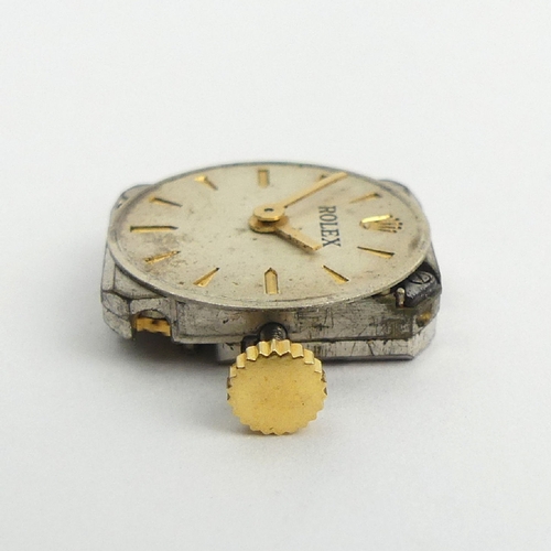 97 - 18t gold Ladies Rolex manual wind, dating from 1954, on a rolled gold strap, 20mm including button. ... 