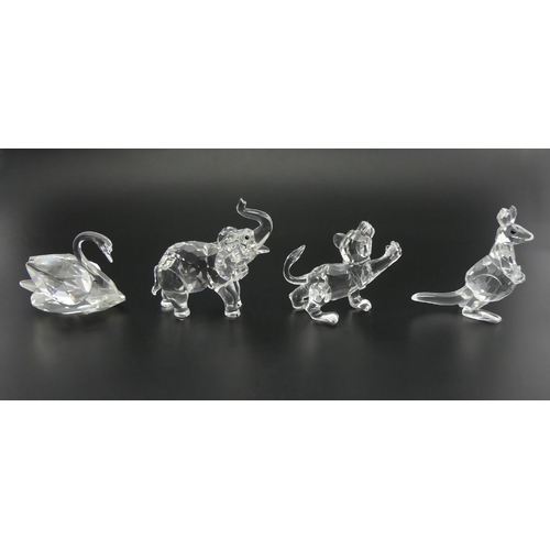 285 - Swarovski crystal figures, a swan, kangaroo, lion cub, and elephant in original boxes, elephant 6.5c... 