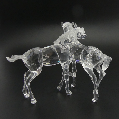 289 - Swarovski crystal Pair of Foals figure in original box, 9cm. UK Postage £12.