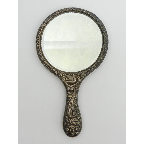 109 - A large silver hand mirror, Birmingham 1908, 28.5cm x 16.5cm. UK Postage £14.