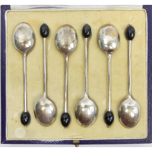 117 - Cased set of Mappin and Webb silver coffee bean spoons, Sheffield 1924, 39 grams, 9.5cm. UK Postage ... 