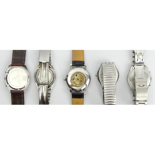 92 - Five Gents watches including a Seiko Day Date Automatic example. UK Postage £12.