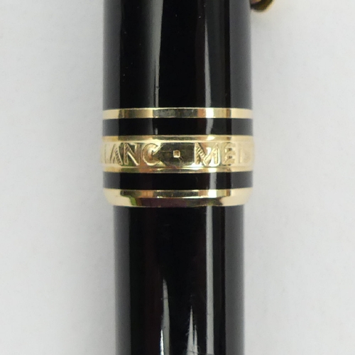 150 - Mont Blanc Meisterstuck ball point pen in black and gold, 13.5cm, UK Postage £12.