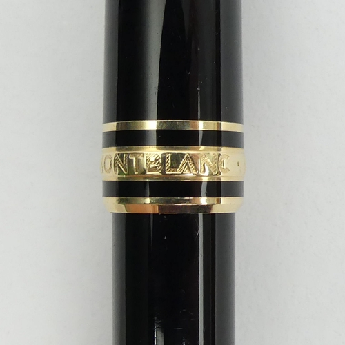 150 - Mont Blanc Meisterstuck ball point pen in black and gold, 13.5cm, UK Postage £12.