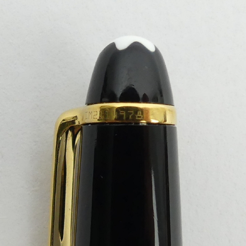 150 - Mont Blanc Meisterstuck ball point pen in black and gold, 13.5cm, UK Postage £12.