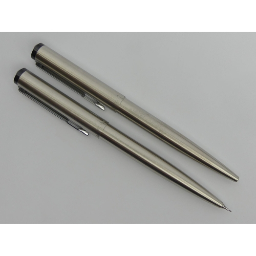 155 - Parker Vector stainless steel propelling pencil and ballpoint pen, cased set, 13cm. UK Postage £12.