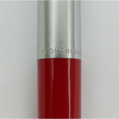 157 - Unusual Mont Blanc stainless steel and red ballpoint pen, No 692, 13.2cm, UK Postage £12.