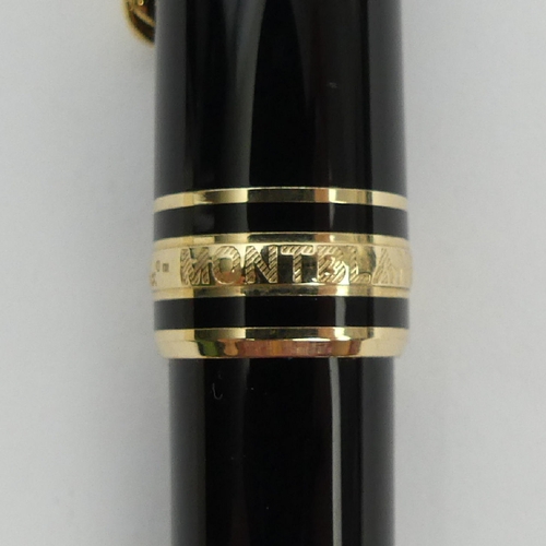 161 - Mont Blanc Meisterstuck black and gold ballpoint pen, 13.5cm. UK Postage £12.