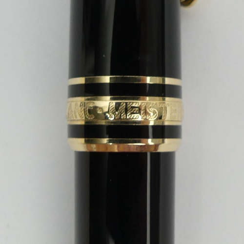 161 - Mont Blanc Meisterstuck black and gold ballpoint pen, 13.5cm. UK Postage £12.