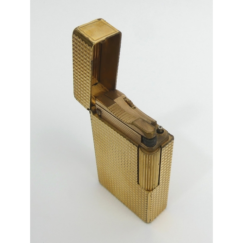 162 - S.T. Dupont Paris gold plated butane lighter, 58mm. UK Postage £12.