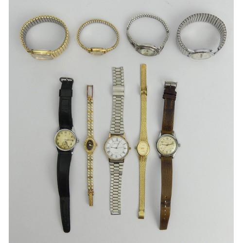 98 - A box of mostly Gents watches including vintage examples. UK Postage £12