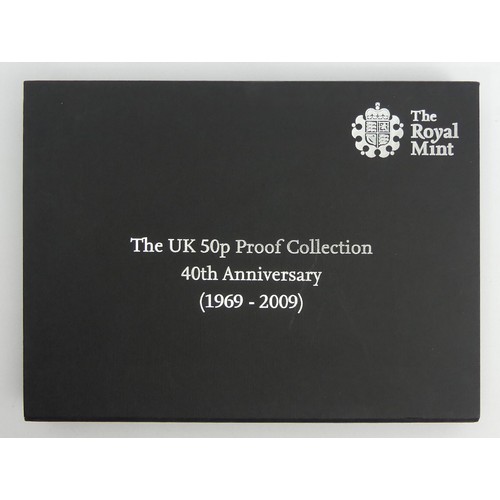 100 - The Royal Mint UK 2009 50p silver proof collection, including Kew Gardens with it's booklet. UK Post... 