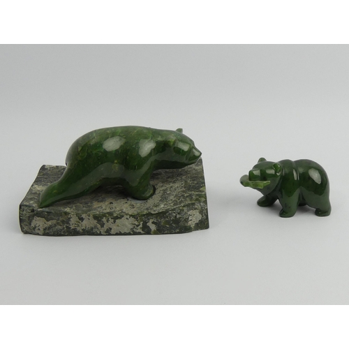 182 - Two Chinese carved Jade bears, largest 9cm x 15.5cm. UK Postage £15.