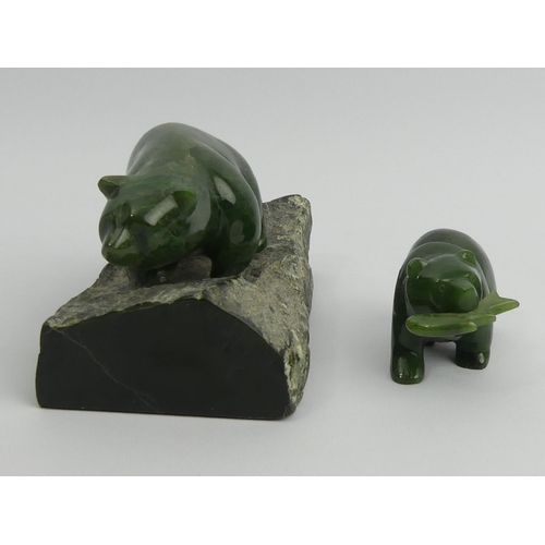 182 - Two Chinese carved Jade bears, largest 9cm x 15.5cm. UK Postage £15.