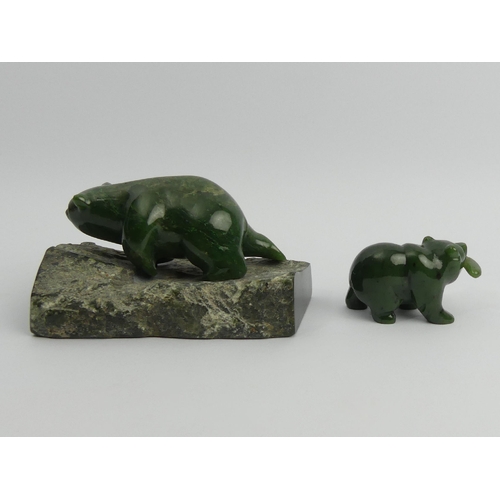 182 - Two Chinese carved Jade bears, largest 9cm x 15.5cm. UK Postage £15.