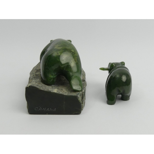 182 - Two Chinese carved Jade bears, largest 9cm x 15.5cm. UK Postage £15.