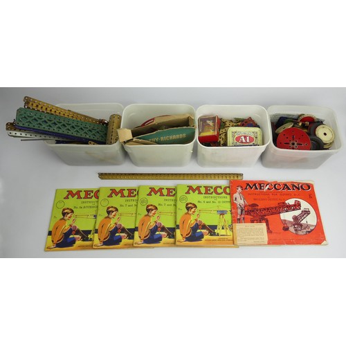 318 - A box of old Meccano including instruction booklets. UK Postage £20.