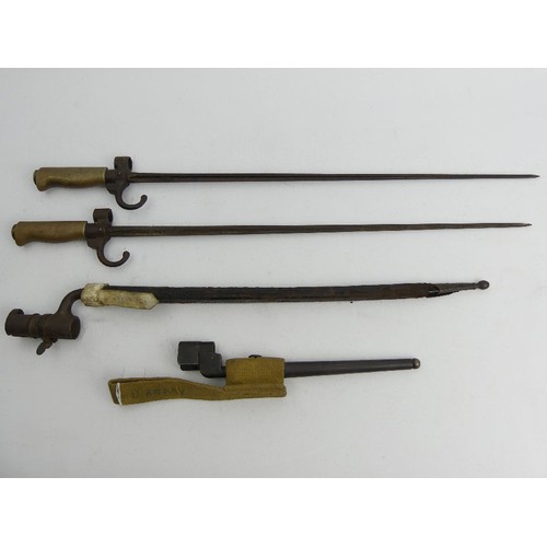 131 - Four spike bayonets, including a British 1890 example with a leather scabbard, longest 64cm, UK Post... 