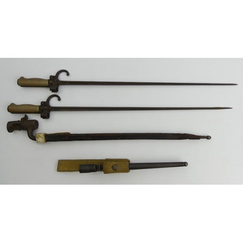 131 - Four spike bayonets, including a British 1890 example with a leather scabbard, longest 64cm, UK Post... 