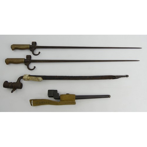 131 - Four spike bayonets, including a British 1890 example with a leather scabbard, longest 64cm, UK Post... 