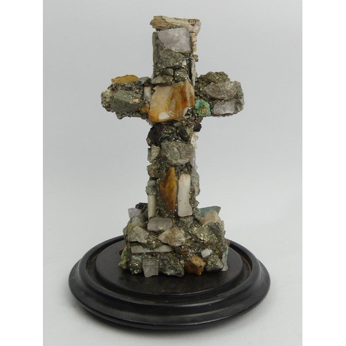 168 - A Victorian specimen stone cross under a glass dome, 28cm high, Collection Only