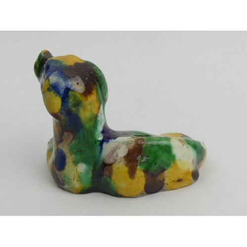 191 - Chinese yellow, green, brown and blue running glaze dog form porcelain inkwell. UK Postage £12.