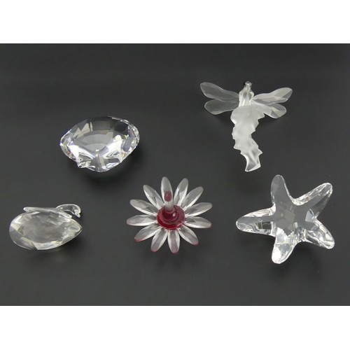 291 - Swarovski crystal shell, starfish, flower, dragonfly and swan, all boxed. UK Postage £12.