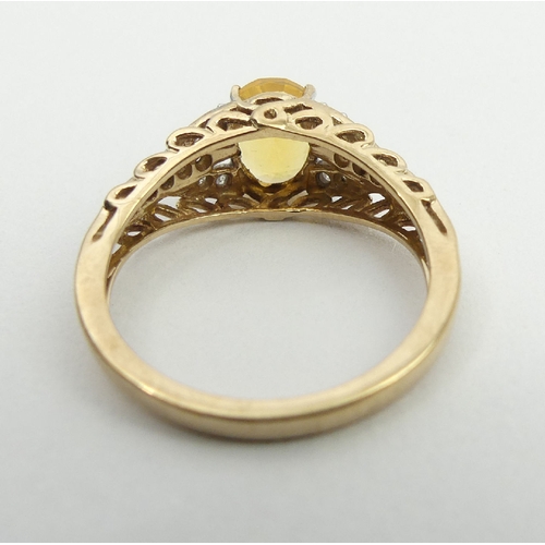 12 - 9ct gold fire opal and diamond ring, 2.6 grams, 8.1mm, size N. UK postage £12.