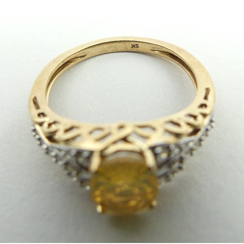 12 - 9ct gold fire opal and diamond ring, 2.6 grams, 8.1mm, size N. UK postage £12.