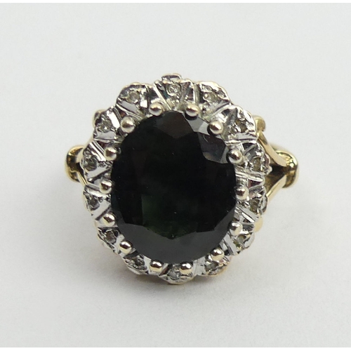 18 - 9ct gold sapphire and diamond ring, Birm.1990, 6.2 grams, 17.1mm, size O. UK postage £12.