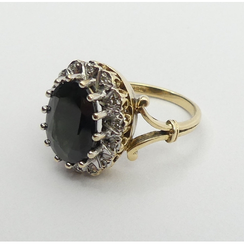 18 - 9ct gold sapphire and diamond ring, Birm.1990, 6.2 grams, 17.1mm, size O. UK postage £12.