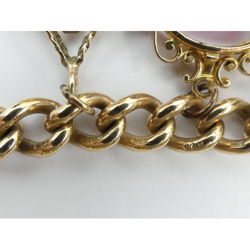 19 - 9ct gold heavy charm bracelet,185.3 grams, chain width 8.5mm. UK postage £12.