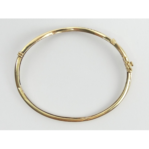 20 - 9ct gold wave design diamond set bangle, 9.7 grams, 3mm, UK postage £12.